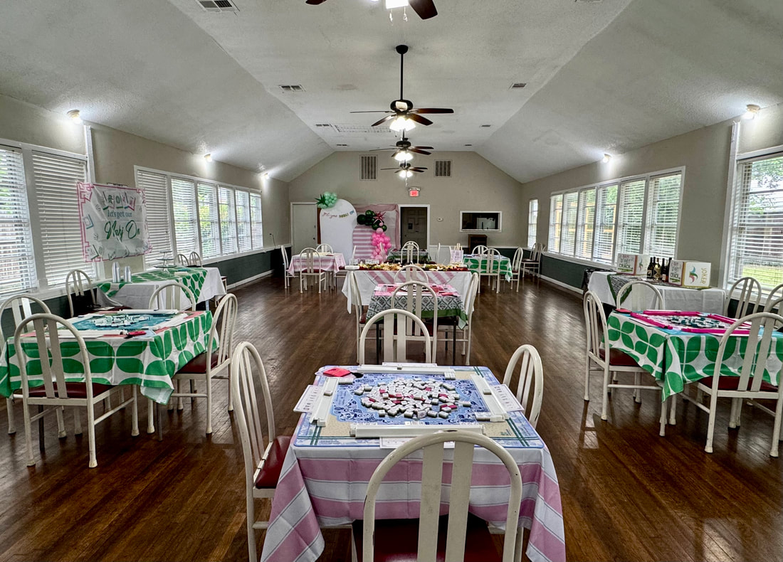 Game night setup with charcuterie spread and pink and green party decor